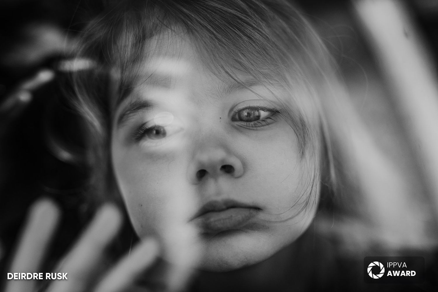 Dramatic black and white portrait collage showing expressions and flowing hair movement. PHOTOGRAPHER Dublin