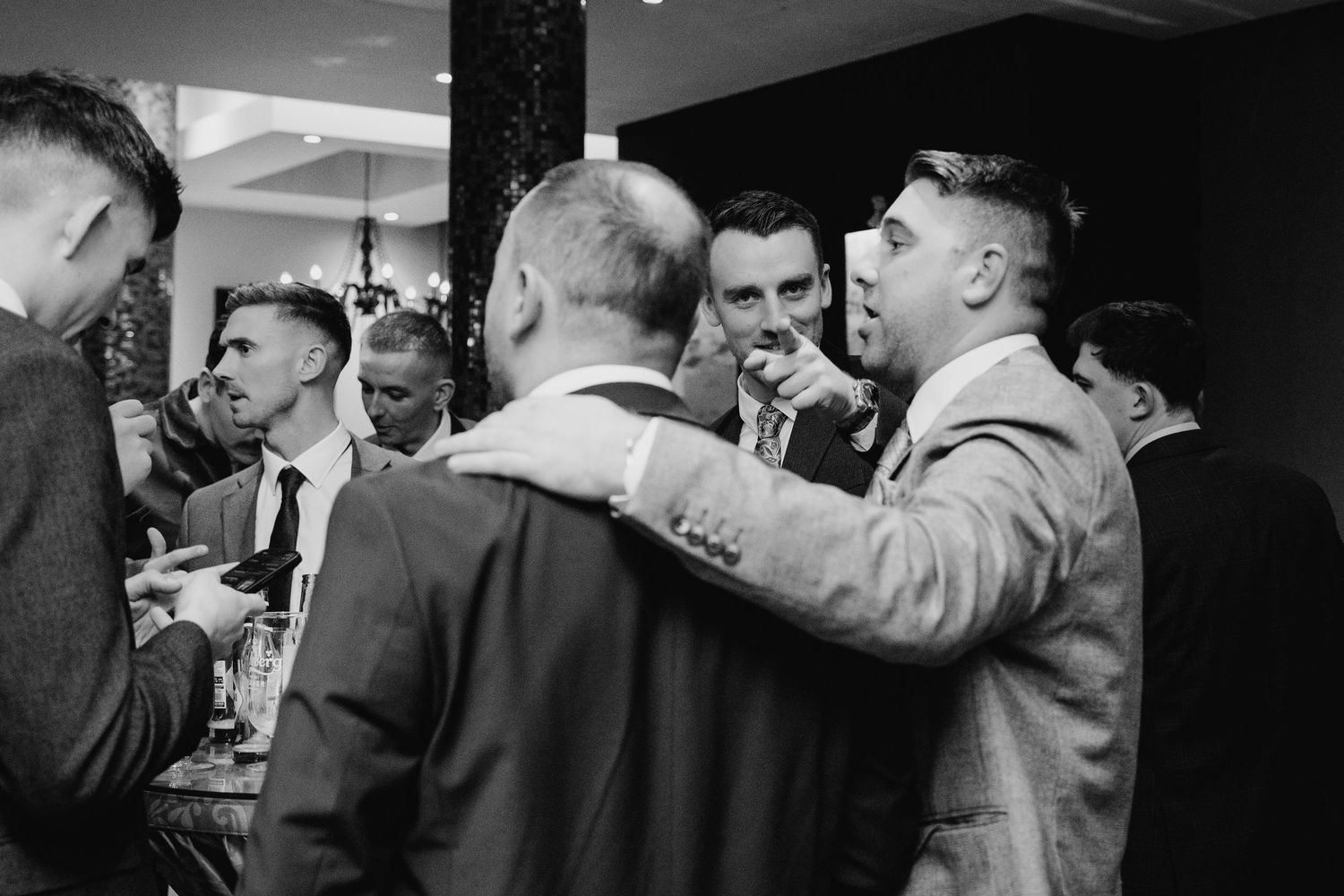 Black and white candid shots of wedding guests celebrating at the reception. Wedding photographer dublin