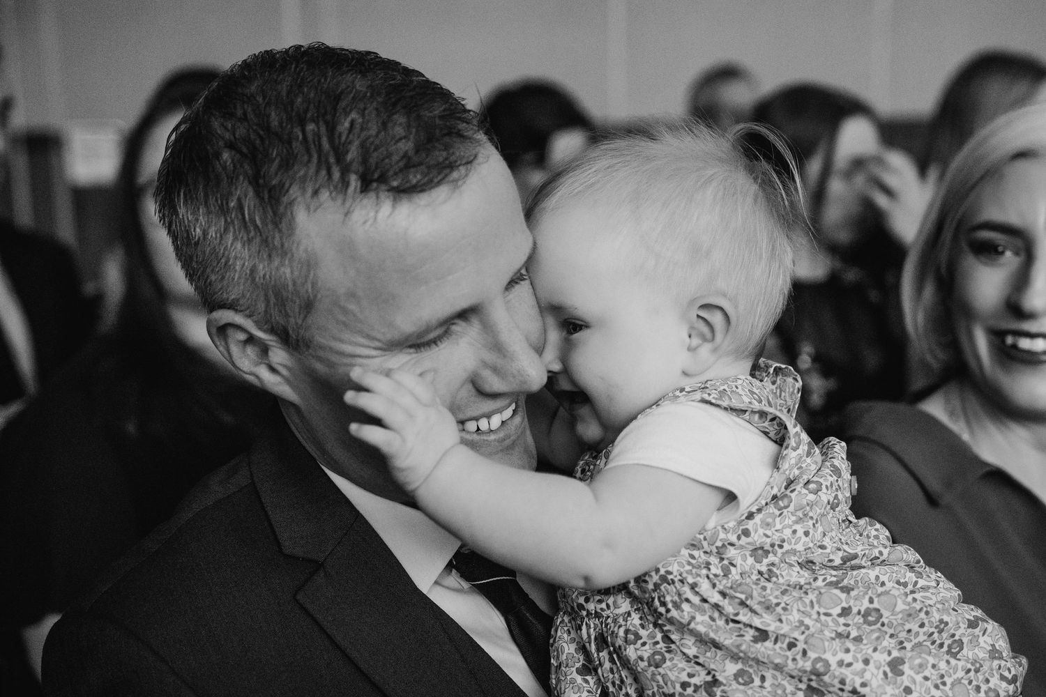 Black and white candid moment captured during wedding ceremony. Wedding Photography Trim Castle Ireland