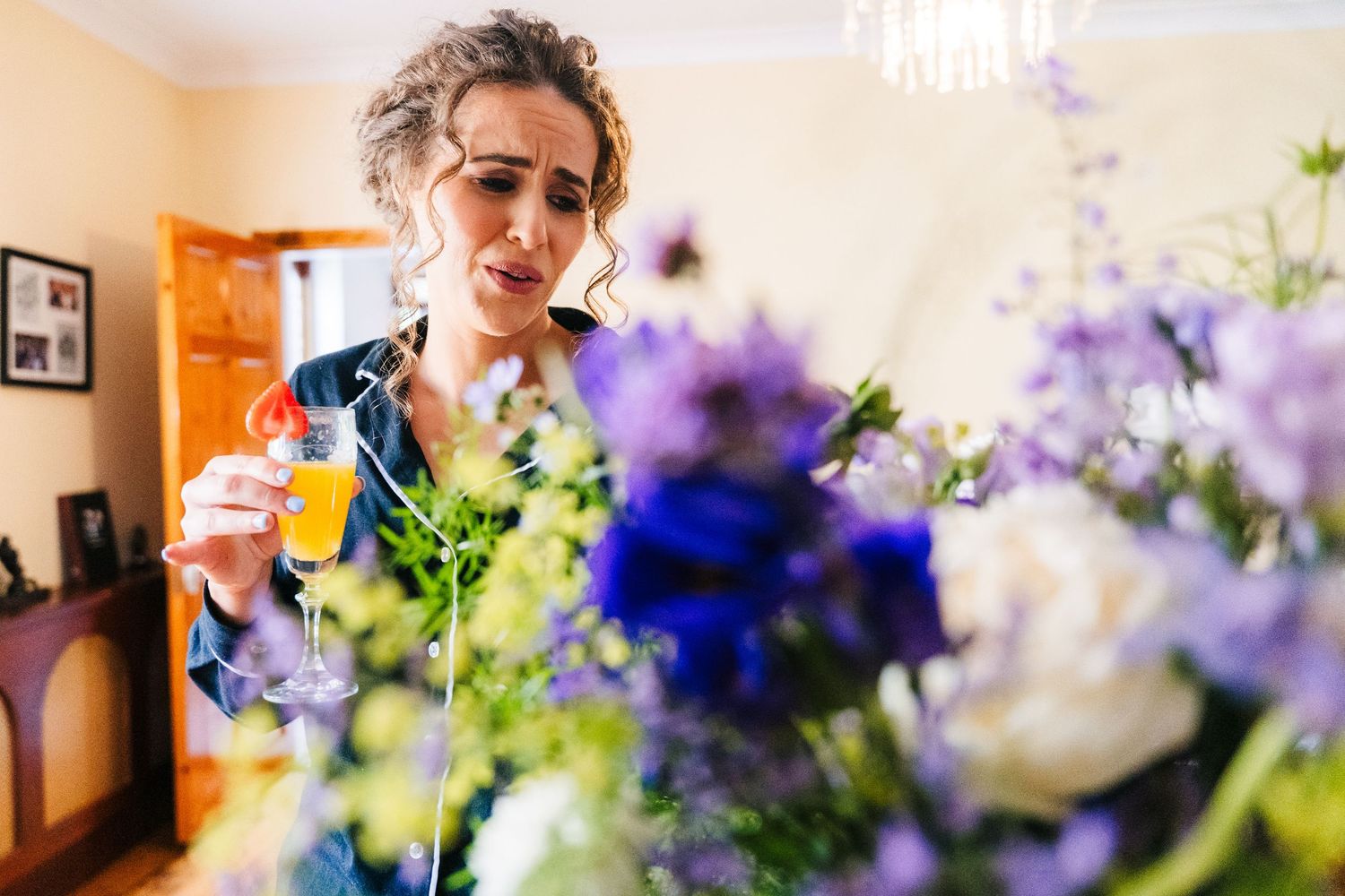Millhouse slane wedding photographer dublinBeautiful blue and purple floral arrangements decorating a wedding venue.