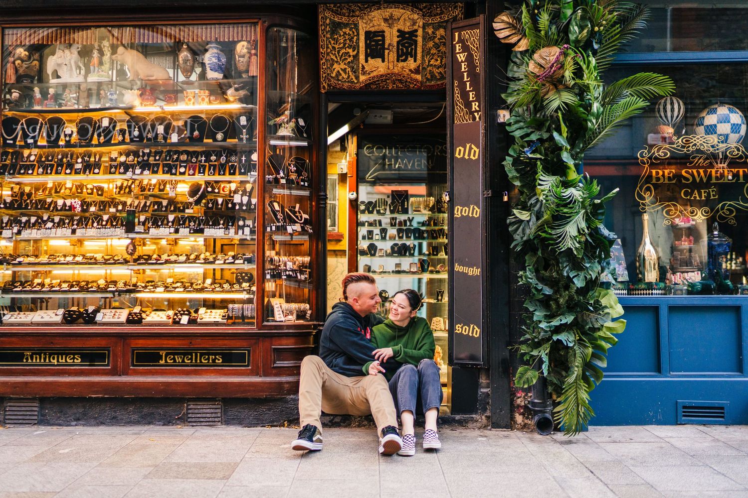 Antique shop window display filled with collectibles and decorative items. PHOTOGRAPHER Dublin Ireland