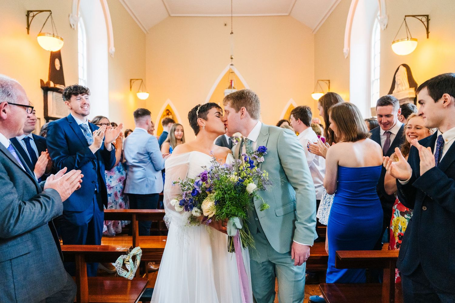 Millhouse slane wedding photographer dublin Intimate indoor wedding ceremony with elegant decor and natural lighting.