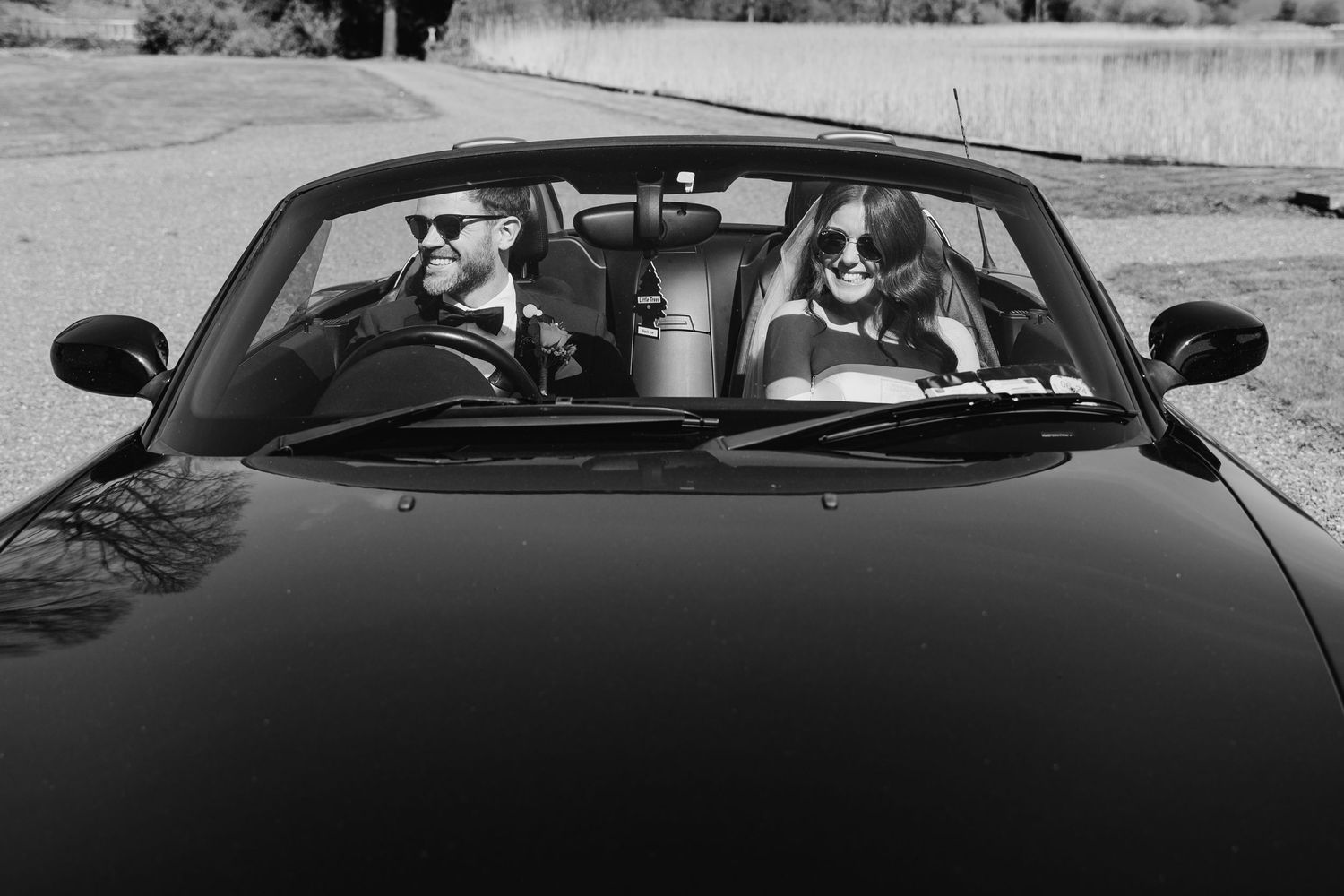 Castle Leslie Wedding Photographer Dublin Black and white series of artistic shots featuring a classic car on the wedding day.