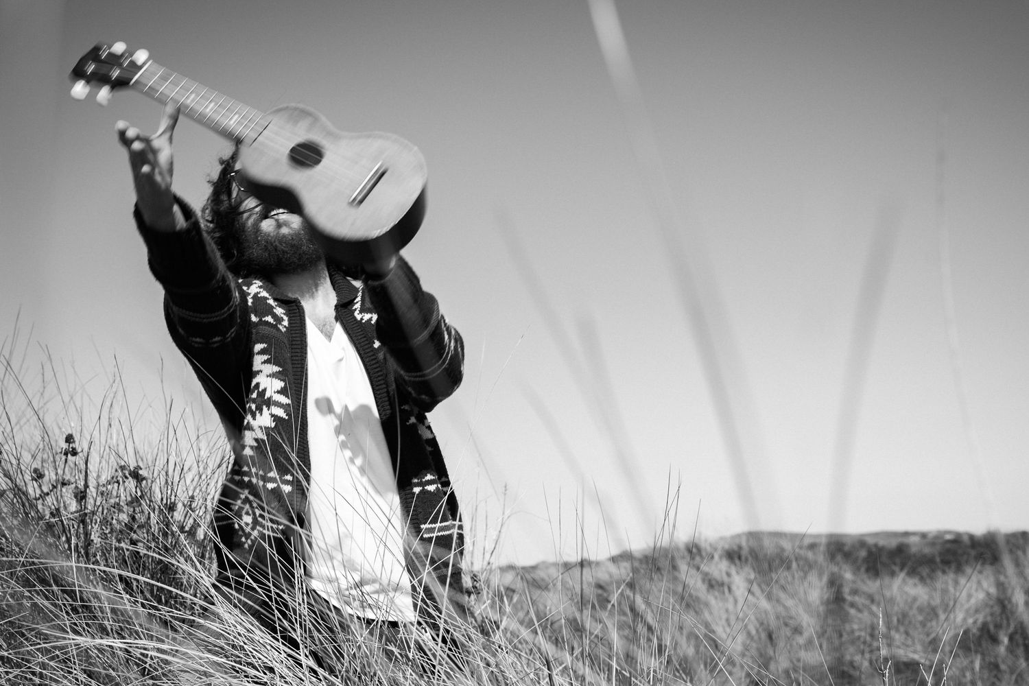 A dramatic black and white portrait photography series of a musician in an outdoor setting. PHOTOGRAPHER Dublin