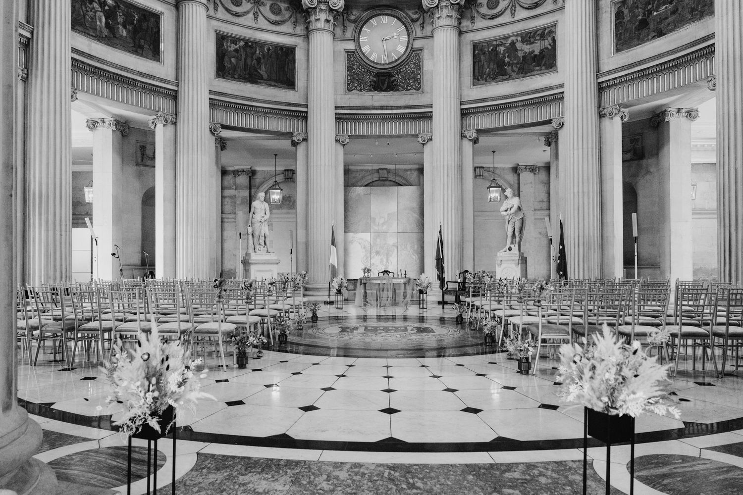 Historic interior panorama of a grand neoclassical room with ornate columns and checkered marble floors. city hall dublin wedding photos