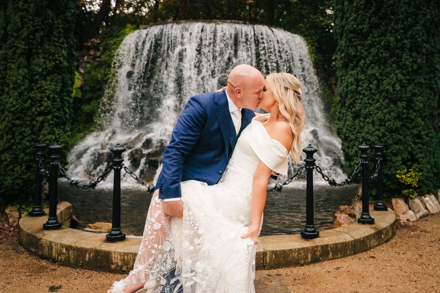A sequence of romantic wedding portraits taken against a decorative garden fountain backdrop. The Dean Dublin Wedding Photographer