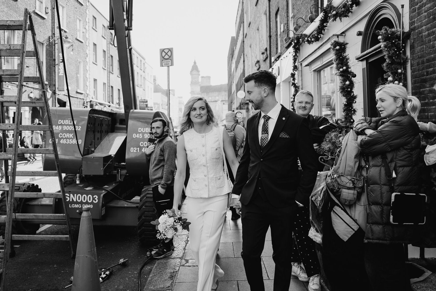 Wedding photography on a charming Dublin street with historic buildings and urban elements. City Hall Dublin wedding photogrAPher