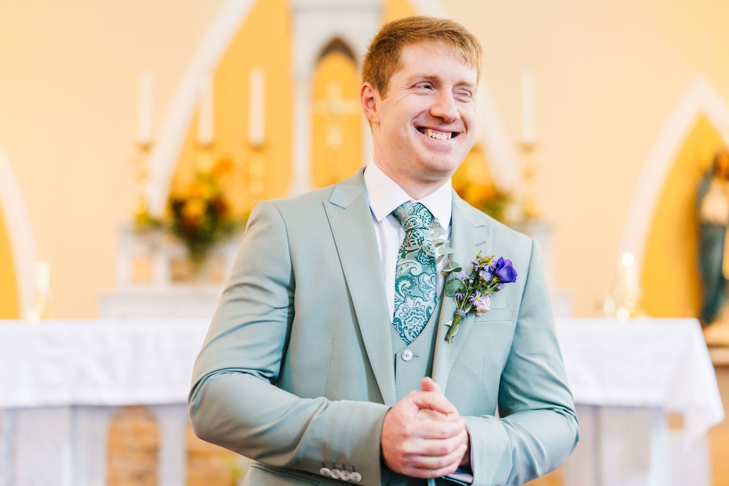 Millhouse slane wedding photographer dublin Wedding party members in grey suits with teal accents gathered for celebratory photos.