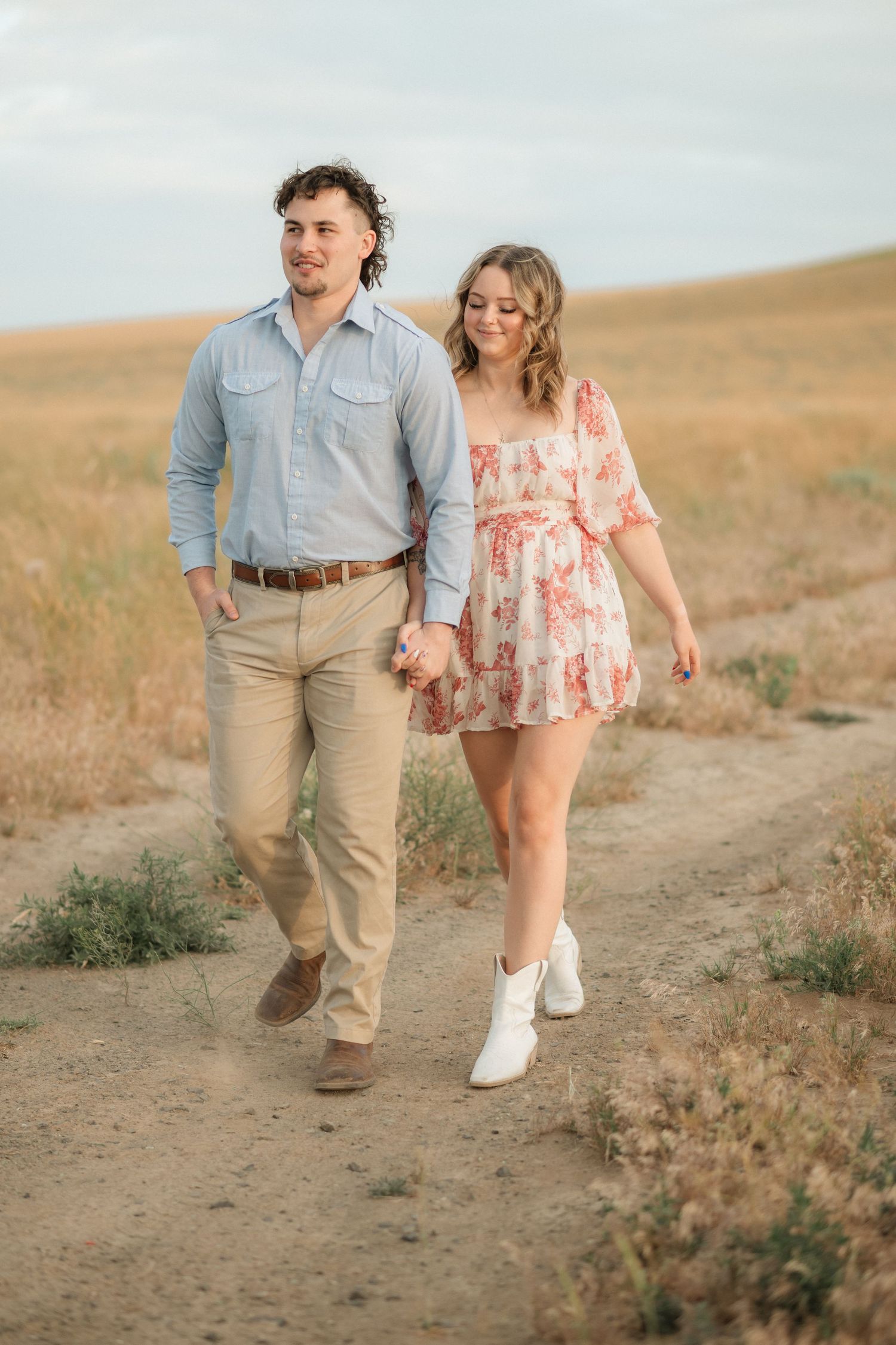 A couples photo in the wheat fields of Kennewick, Washington. Photo taken by a local photographer.