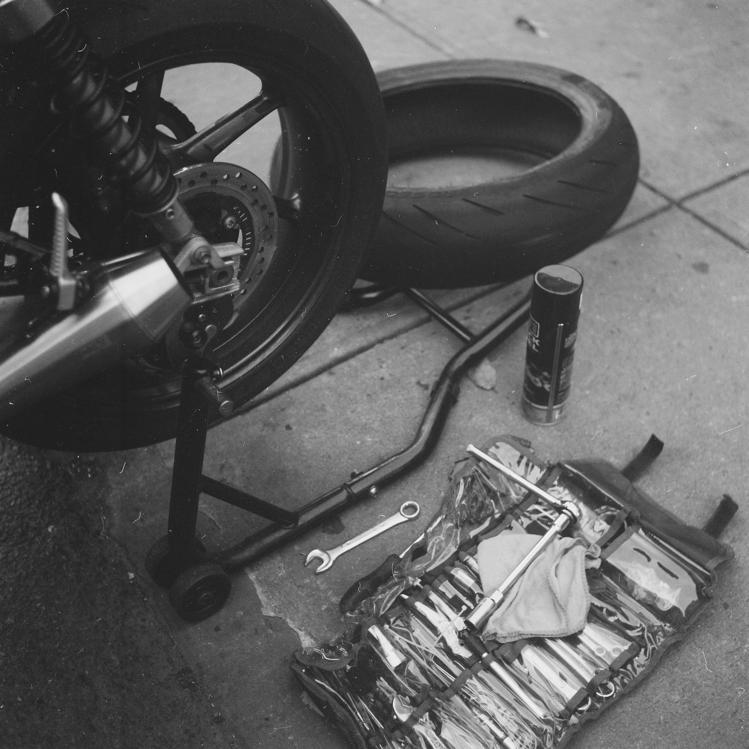 motorcycle and helmet, triumph scrambler 1200, black and white film photography