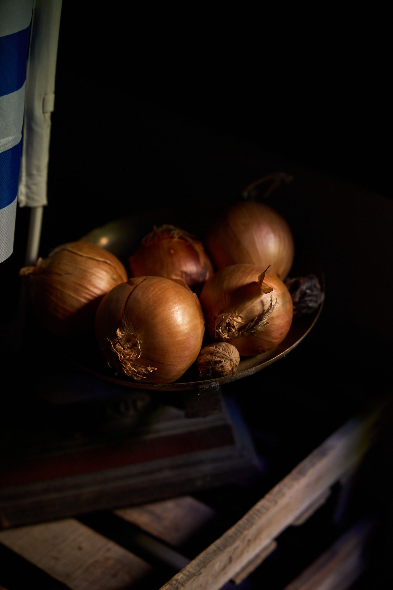 Travel and editorial photography, Provence, France, plate of onions with dramatic sunset light