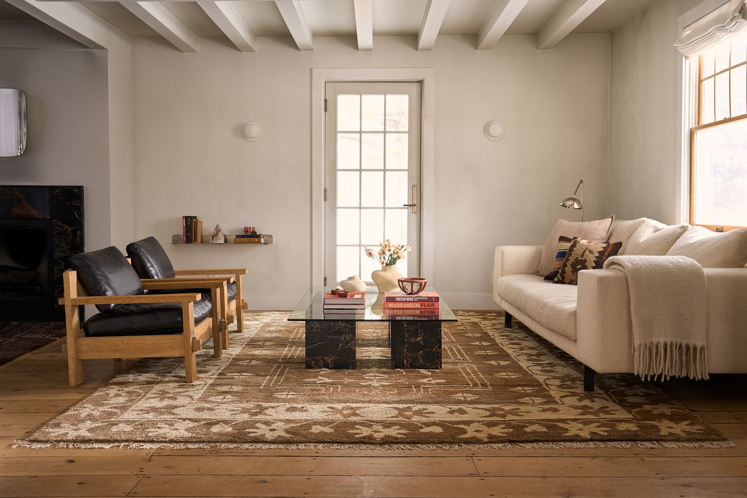 Product and lifestyle photograph of a rug designed and made by Postcard company, photographed upstate NY