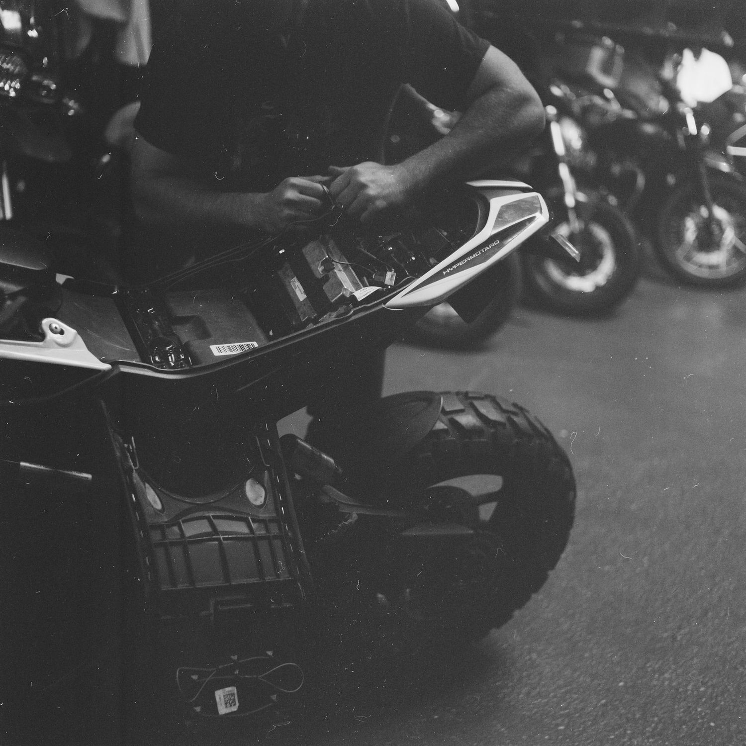 motorcycle and helmet, triumph scrambler 1200, black and white film photography