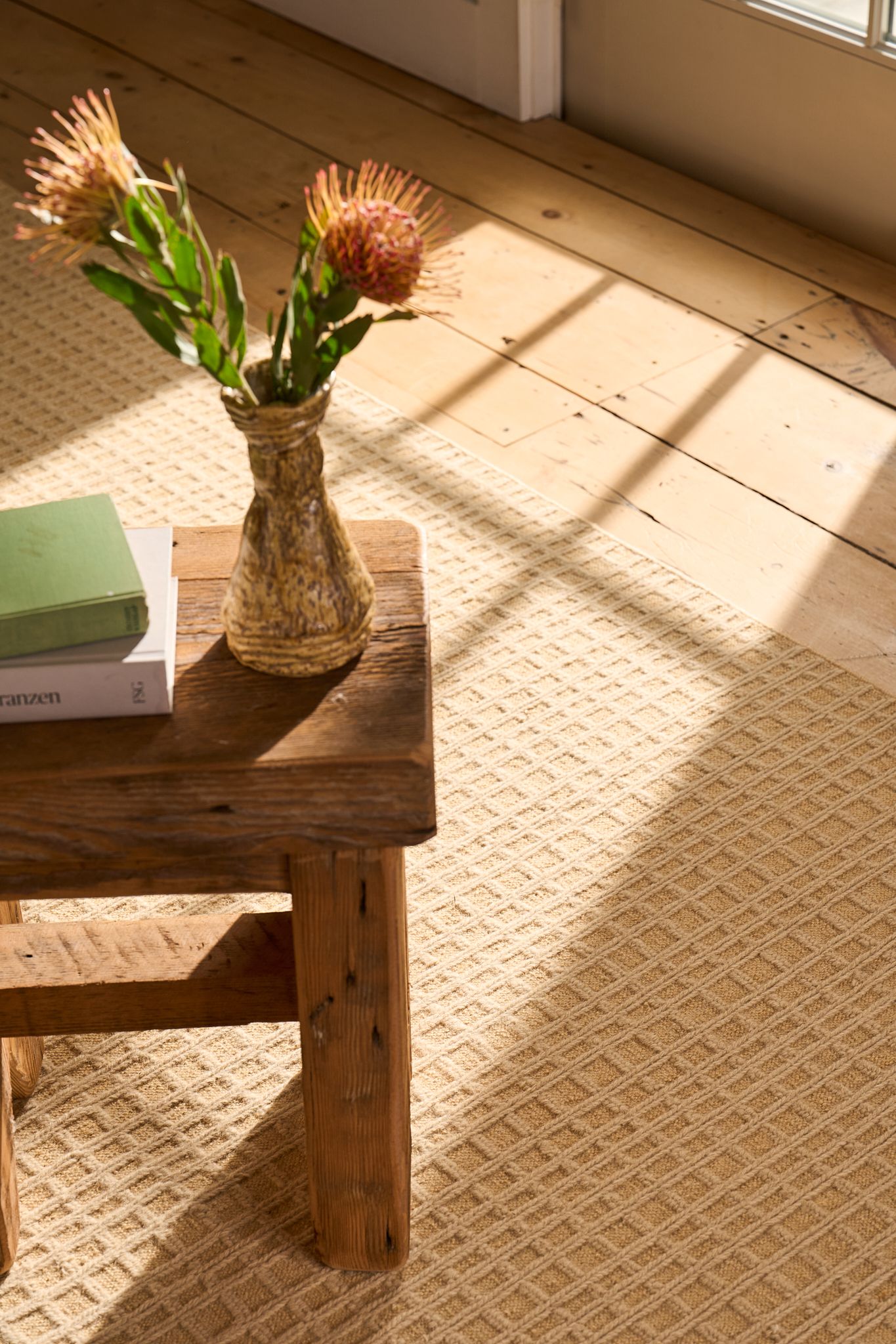 Product and lifestyle photograph of a rug designed and made by Postcard company, photographed upstate NY