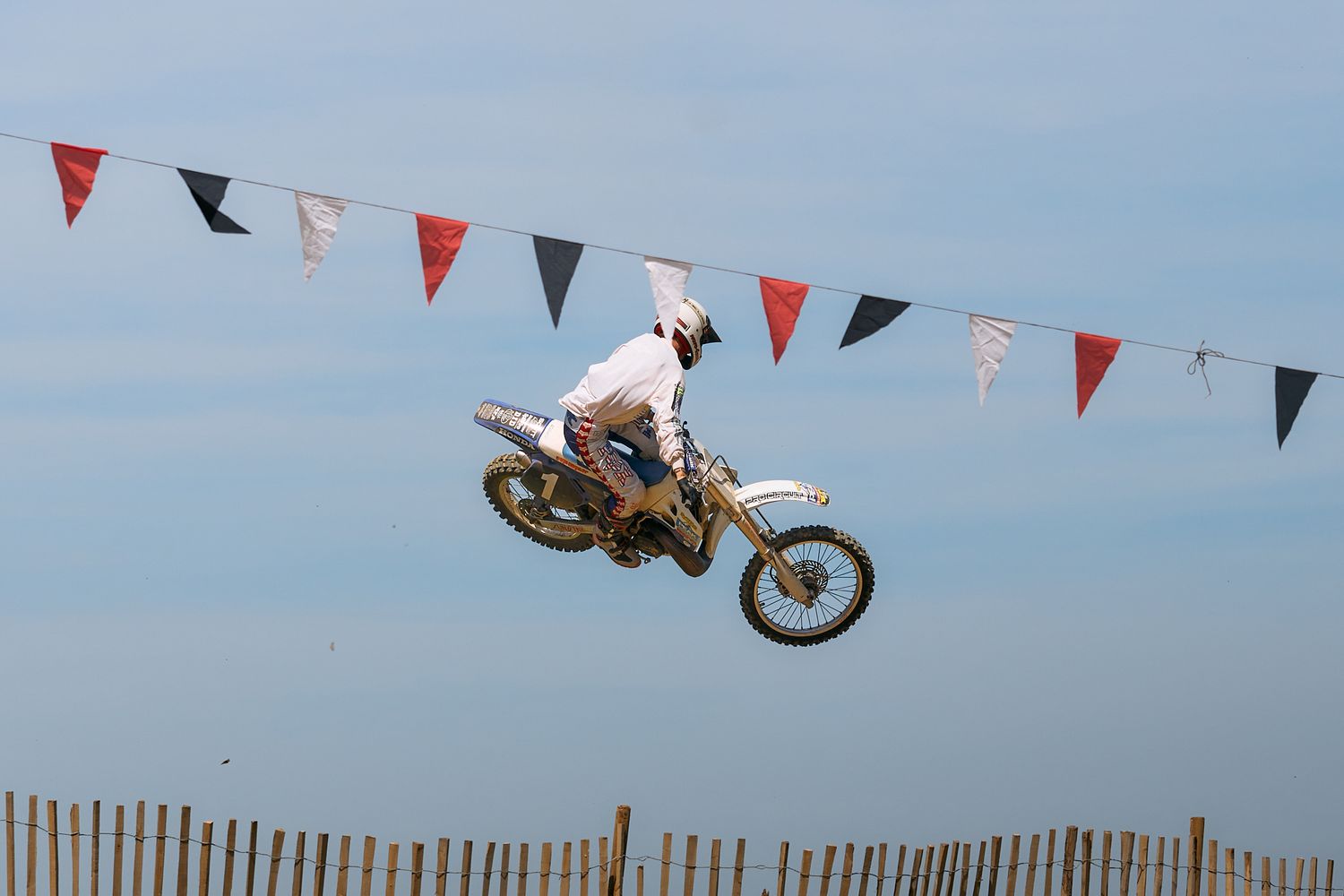 Wheels & Waves festival, vintage enduro motorcycle racing in Biarritz, France.