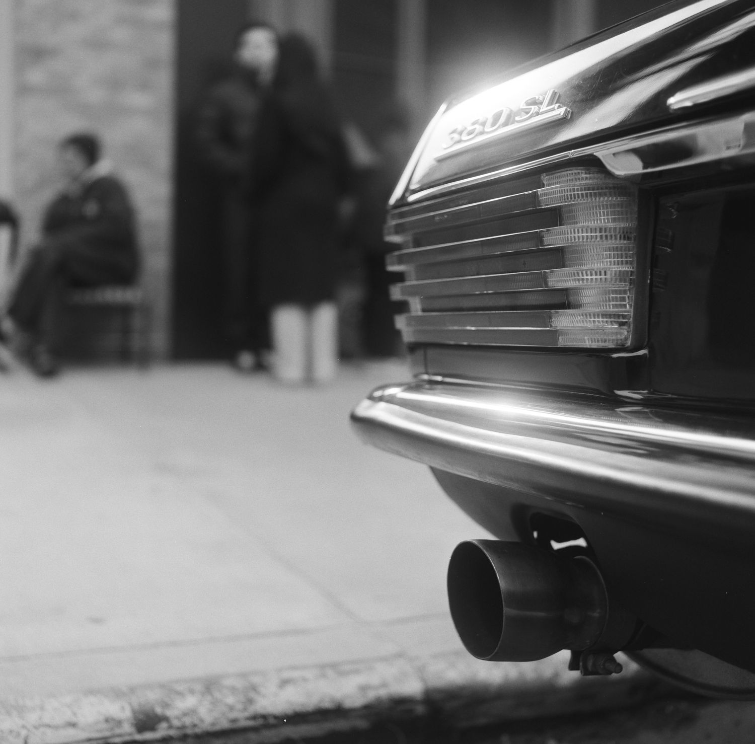 black and white photo of a vintage car at a wheels of NYC event at the Rythm zero coffee shop in Greenpoint Brooklyn, NY