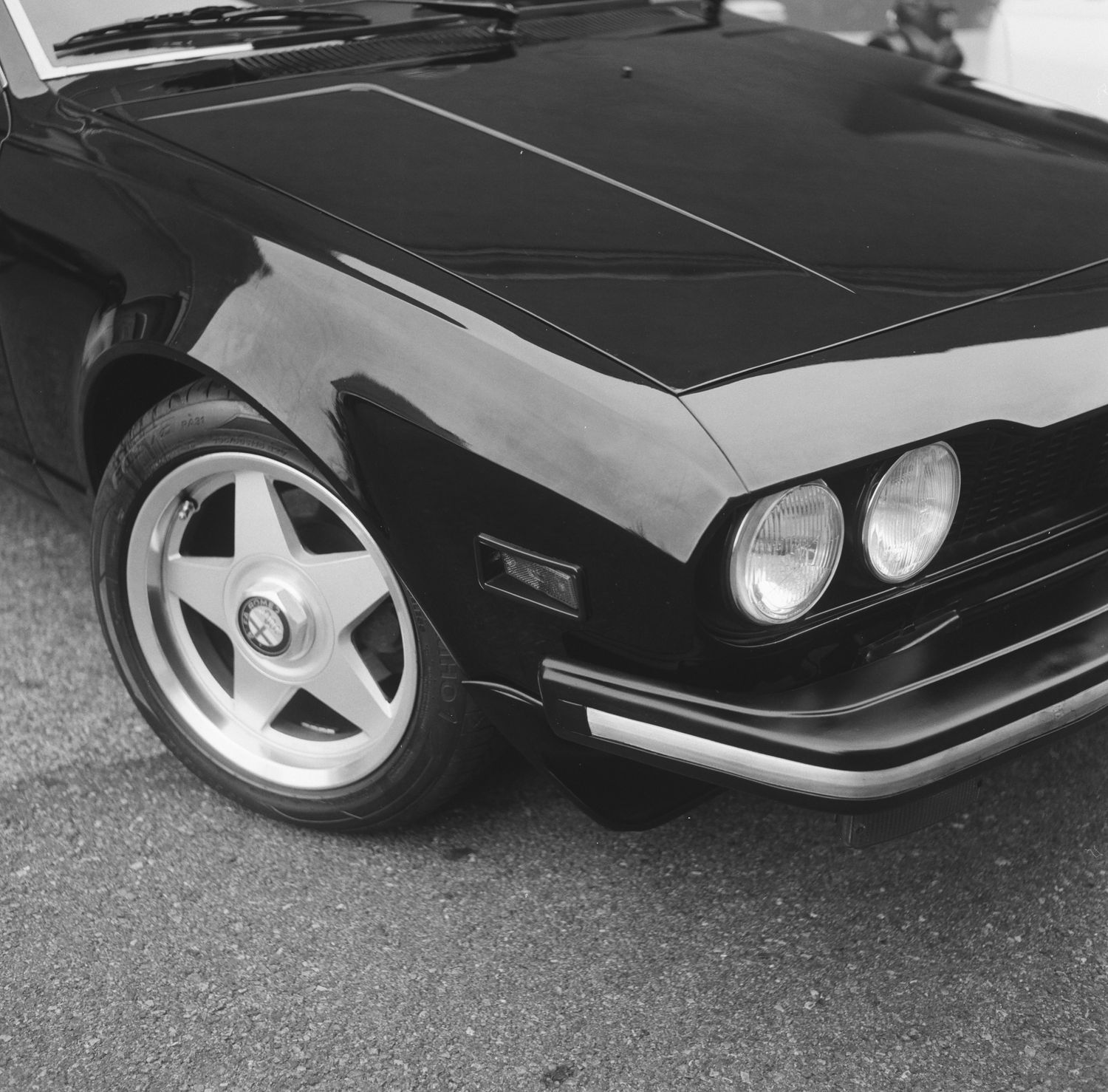 black and white photo of a vintage car at a wheels of NYC event at the Rythm zero coffee shop in Greenpoint Brooklyn, NY
