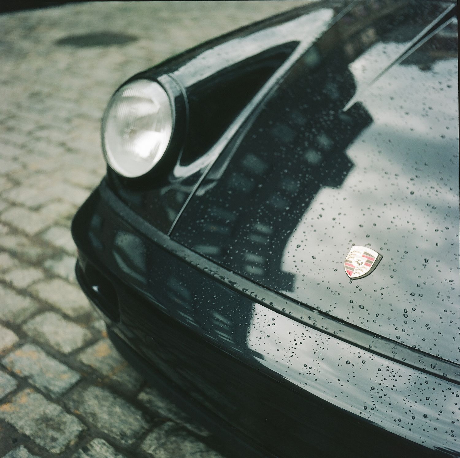 Porsche 911 car, black, photographed on film