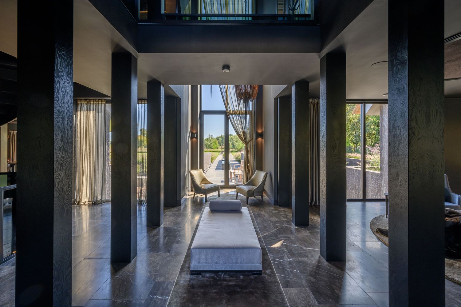 Long corridor with glass walls and modern architectural elements creating dramatic perspective, by Parallel Studios