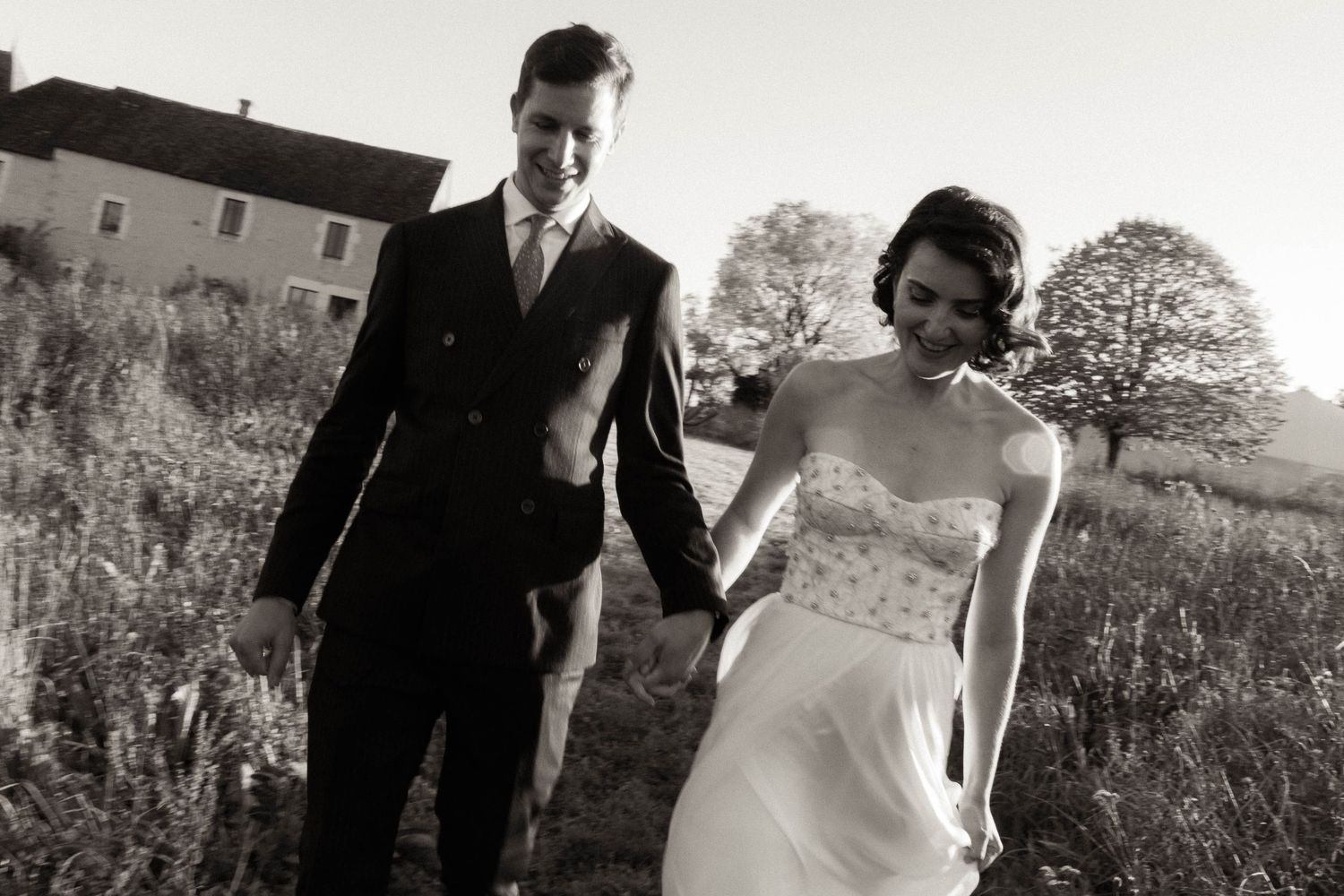A black and white wedding photo collage shows couples in romantic outdoor settings with natural scenery.