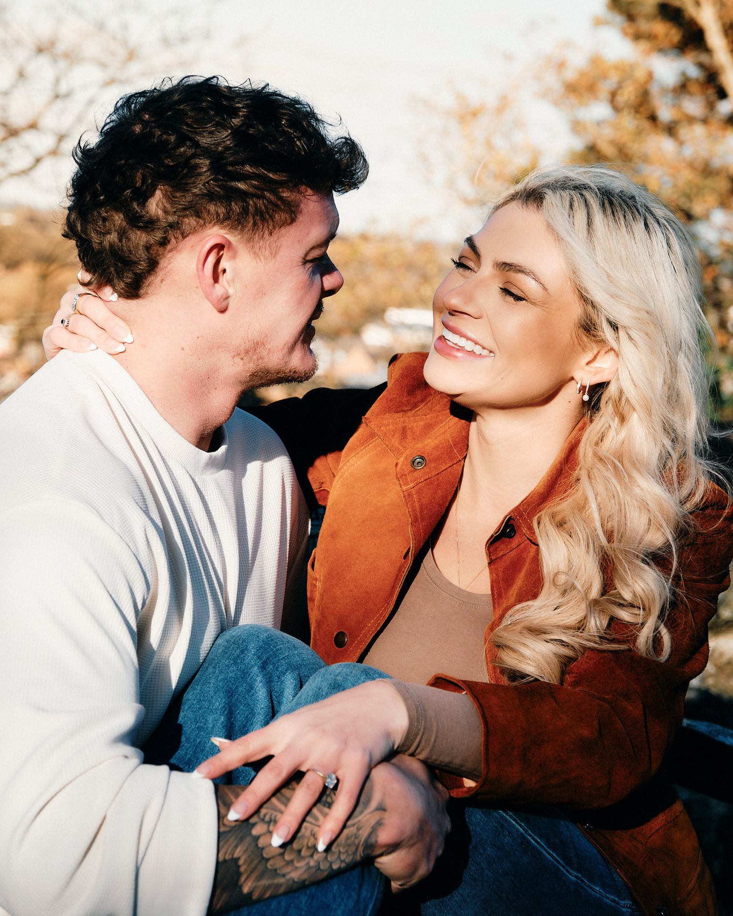 Natural candid moments between a couple during an outdoor photography session.