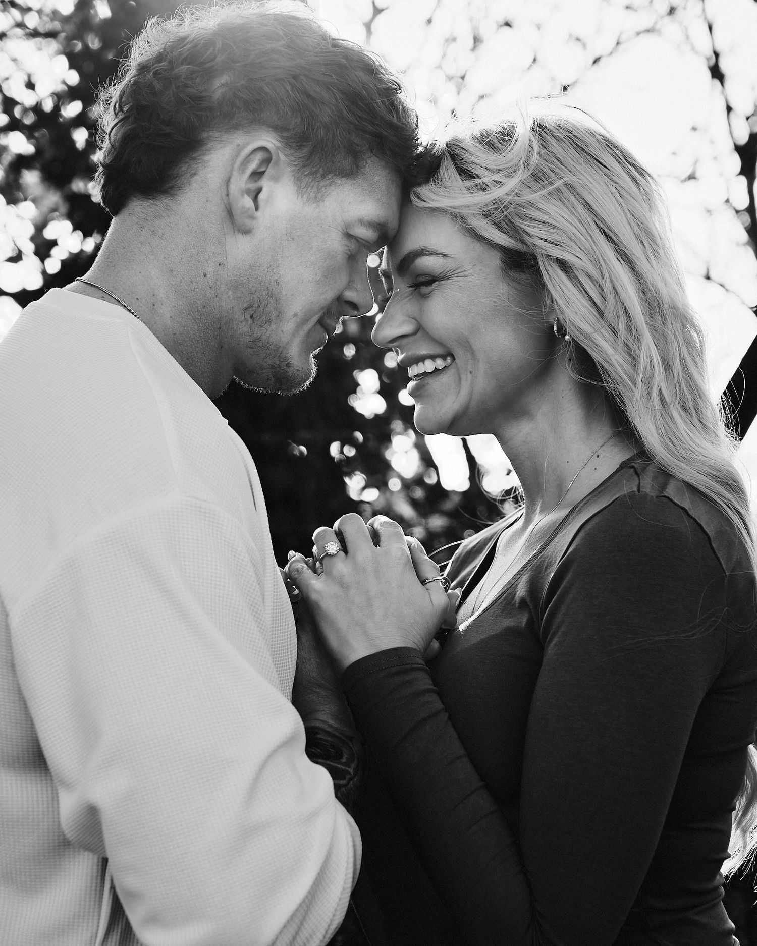 Black and white series of romantic couple moments captured in natural light.