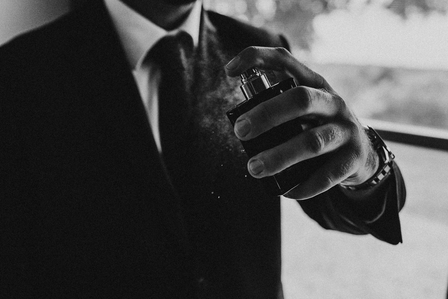 Artistic black and white close-up shots capturing wedding day moments and details.