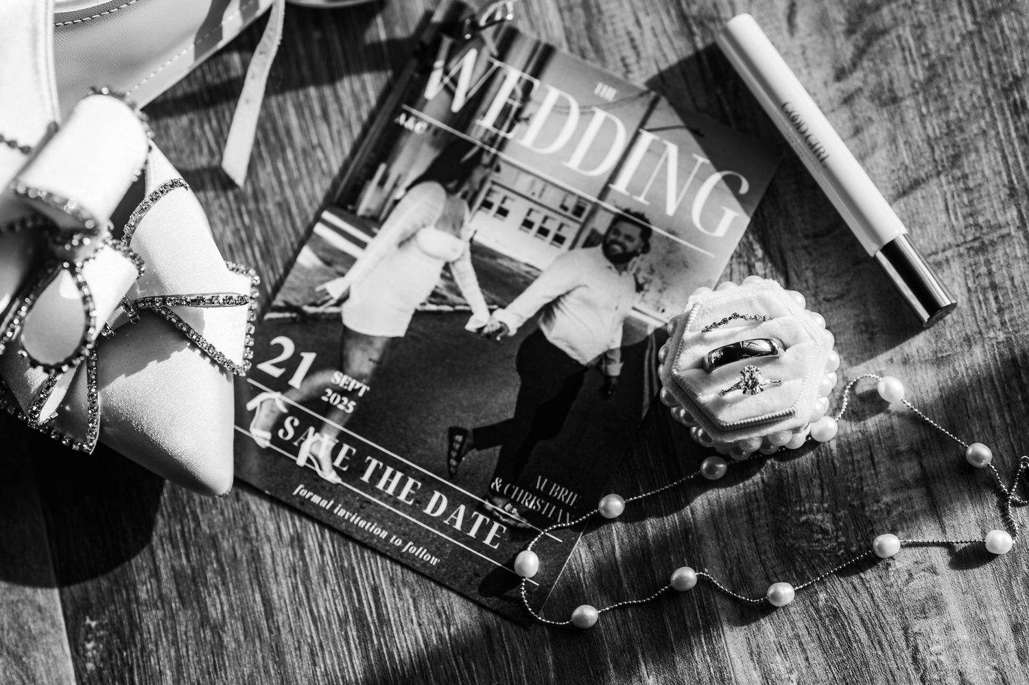 Black and white photo of wedding accessories.