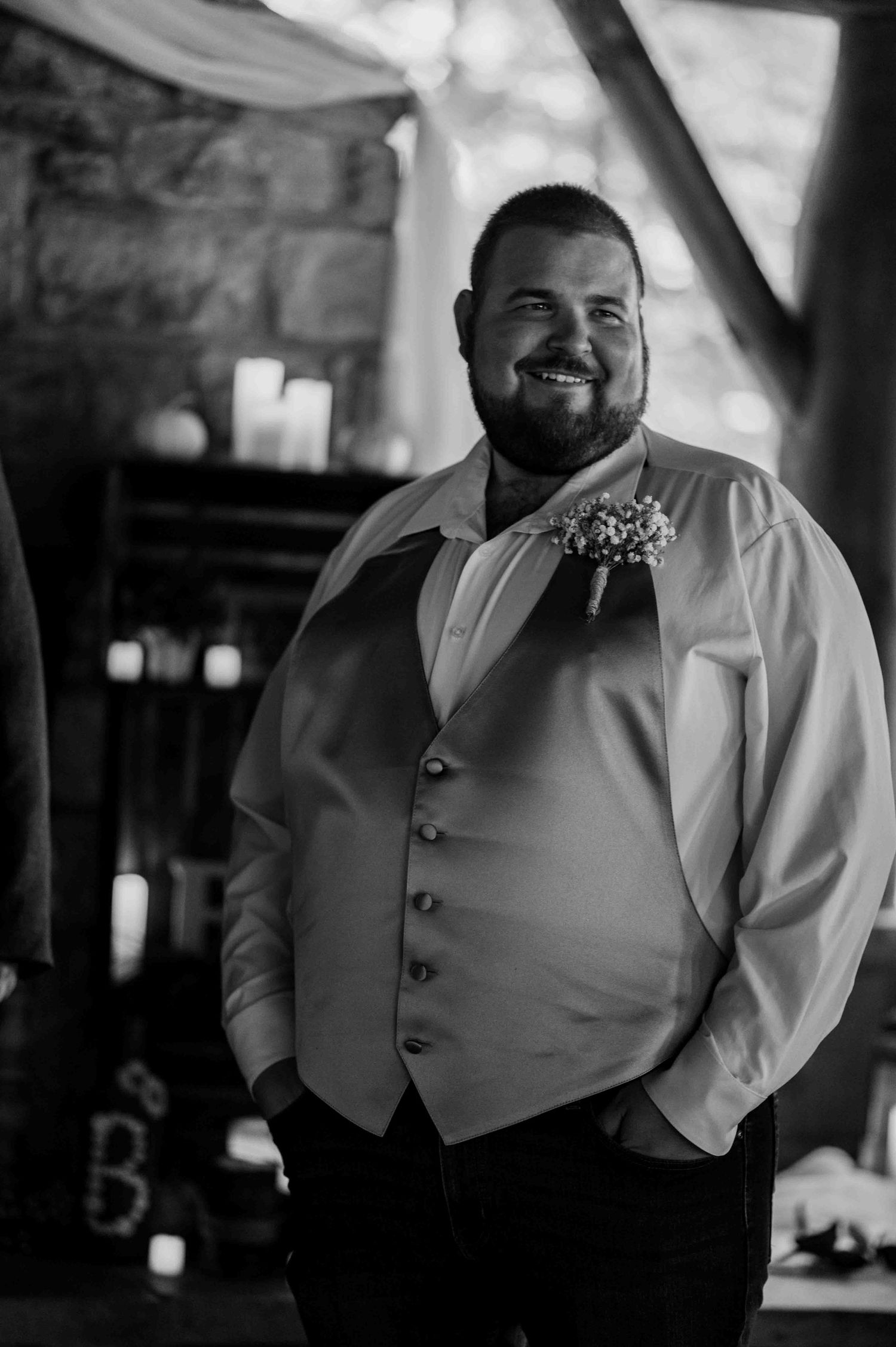 Black and white portrait series showing a formal attire against dark background.