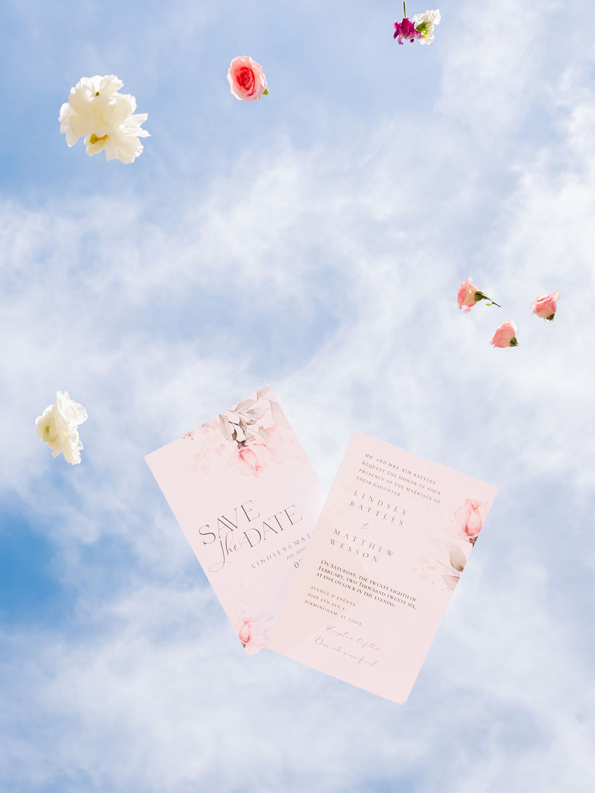 a creative invitation and flower photo by Holli Hobbs photography under beautiful Alabama wedding day blue sky