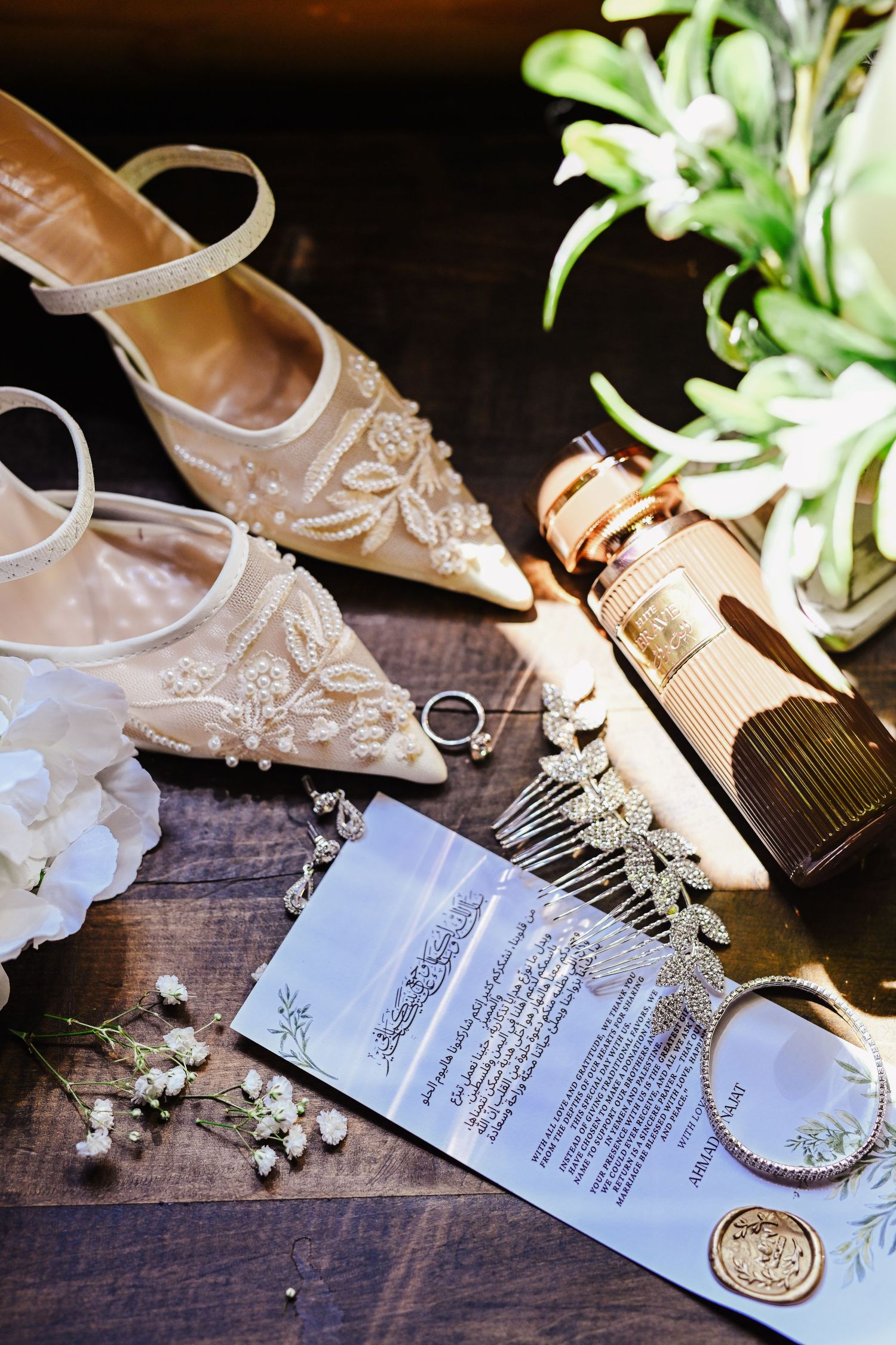 a brides shoes and invitation suite and other wedding rings and details in beautiful Alabama wedding light at shadow wood manor in Moody