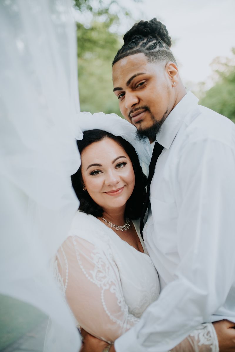 Alabama couple on their wedding day beautiful veil portrait