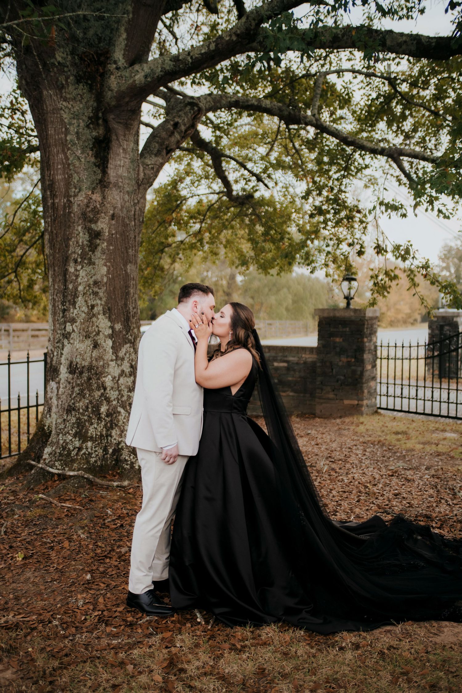 a bride in her black dress at Matthew's Manor on her wedding day in Springville Alabama
