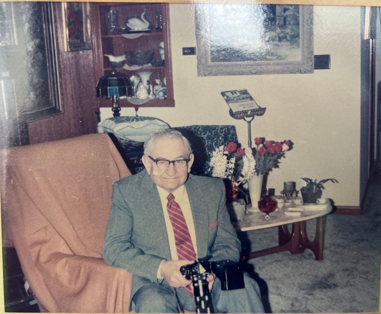 Sarah Channing’s grandfather holding his Nikon camera, decades before Sarah discovered their shared connection to photography.