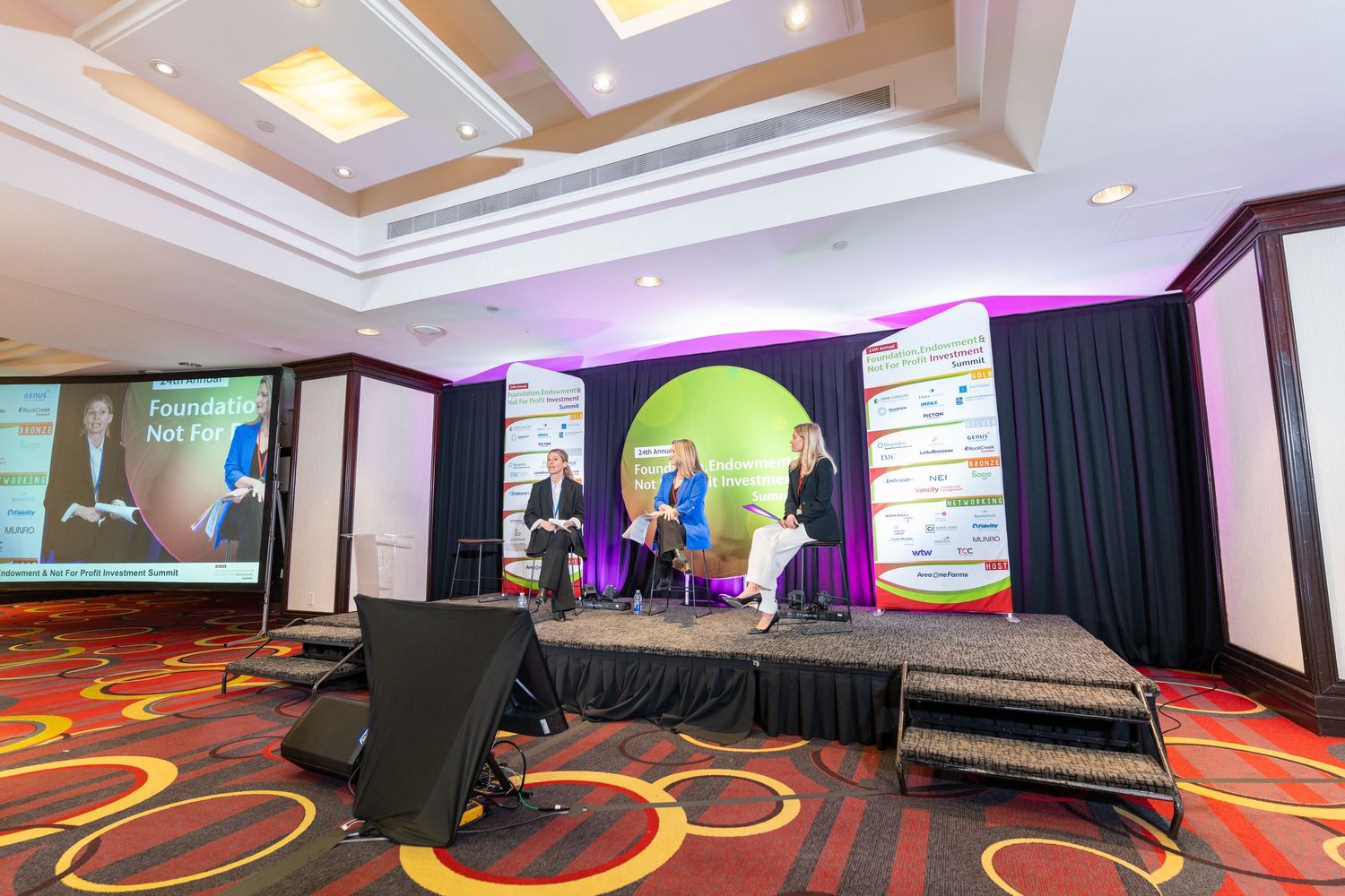 Empty conference stage setup at the Foundation Endowment Not For Profit Investment Summit venue.