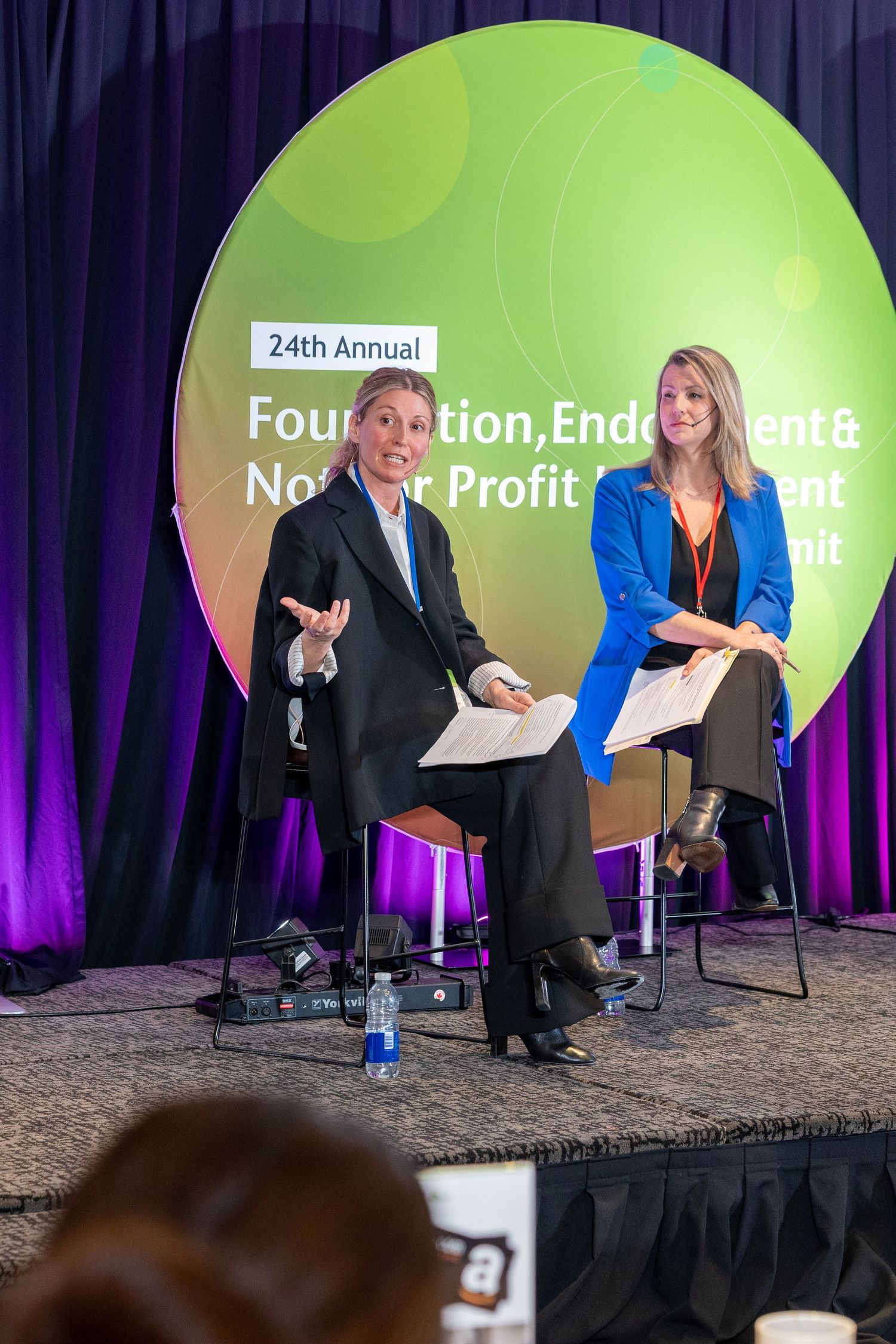 Two women speaking on stage at the 24th Annual Foundation Endowment and Not-for-Profit Investment Summit.