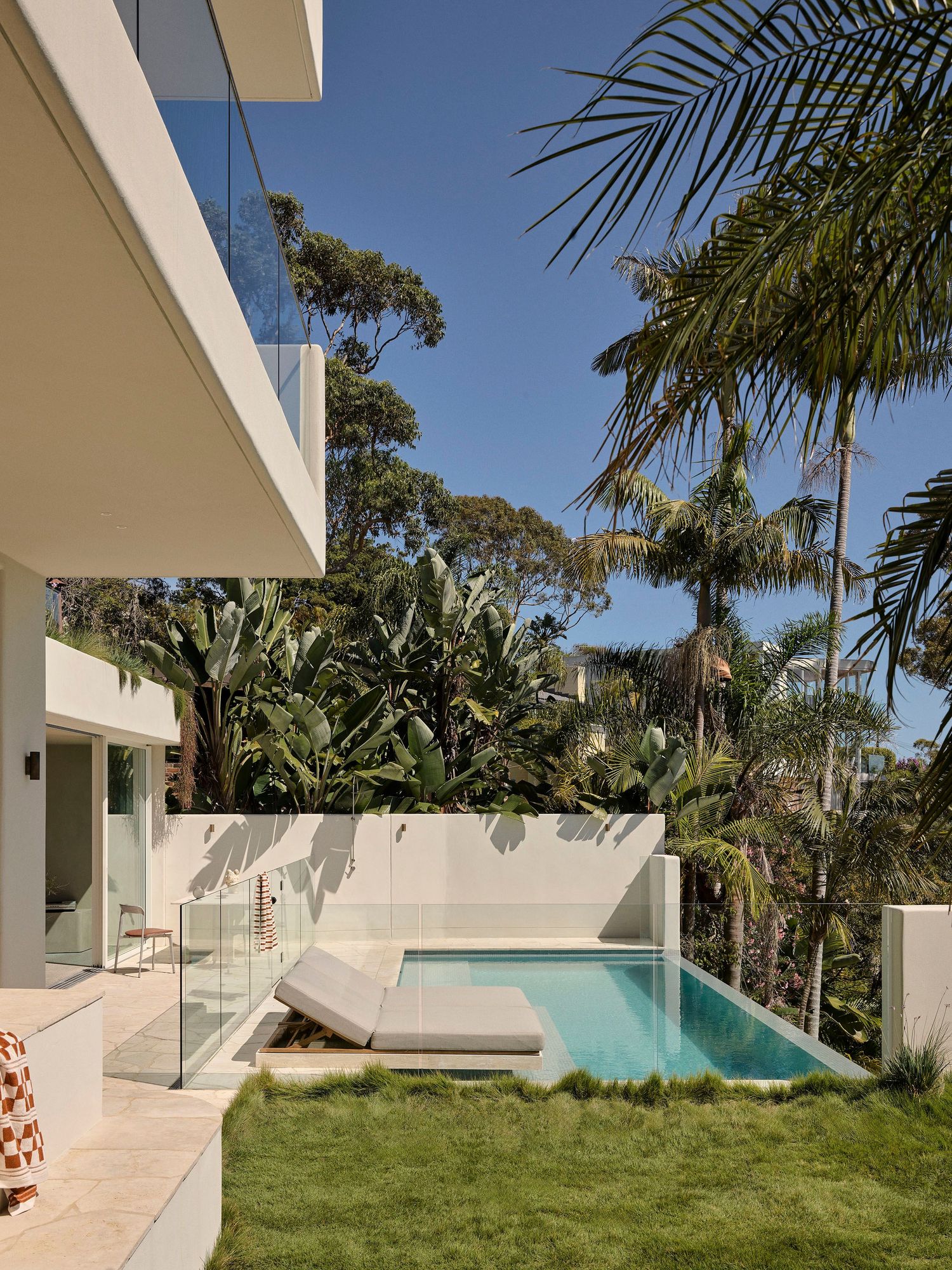 Alaia Palm Beach, heated pool and outdoor entertainment.