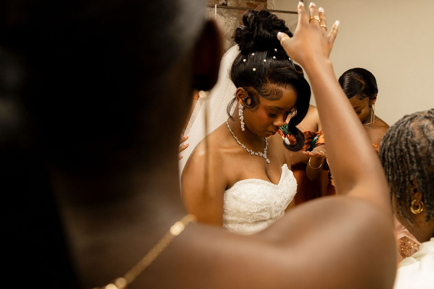 A romantic moment between newlyweds dancing together at their wedding reception.