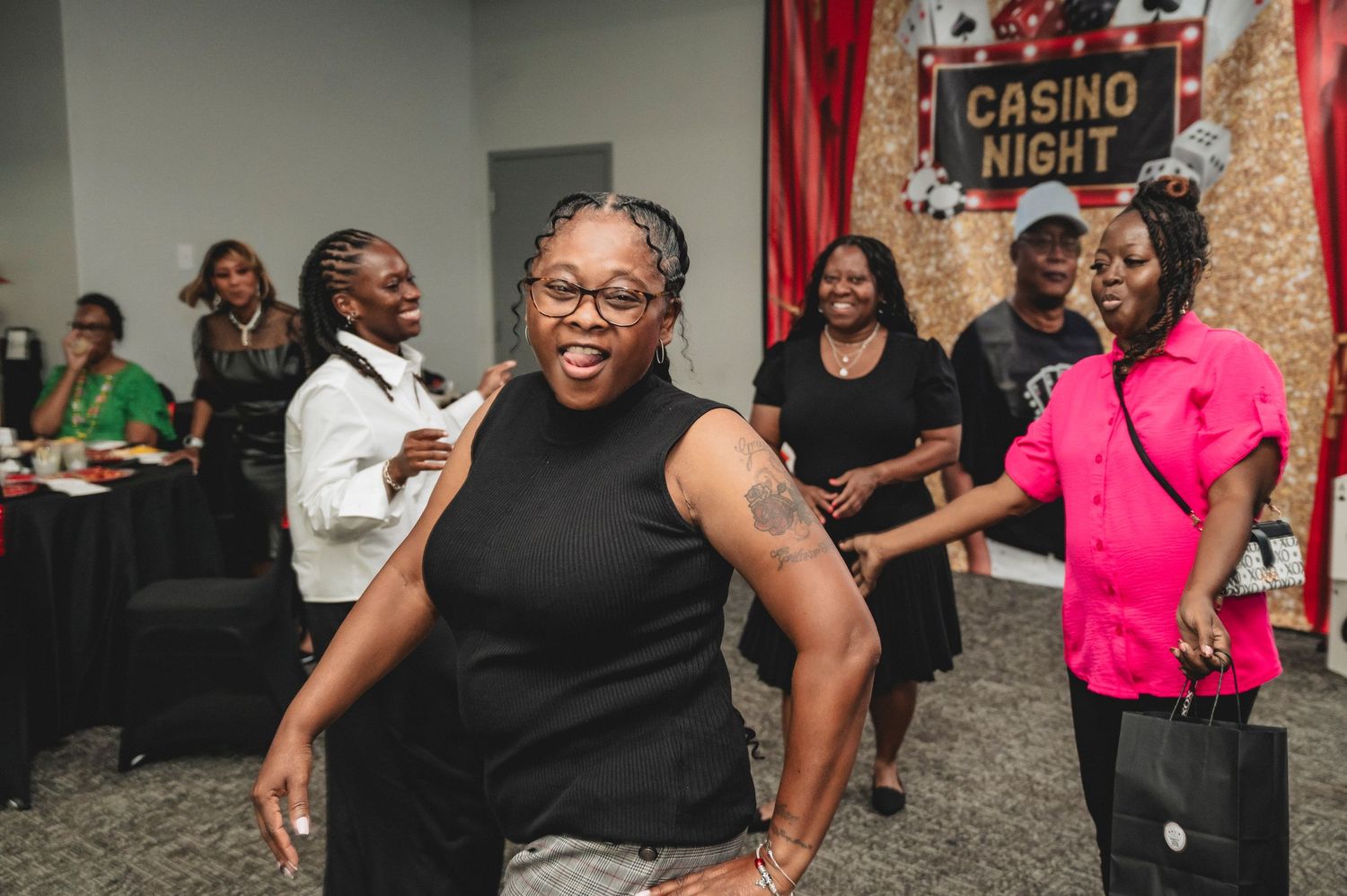 Casino night celebration showing guests dancing and enjoying the festivities.