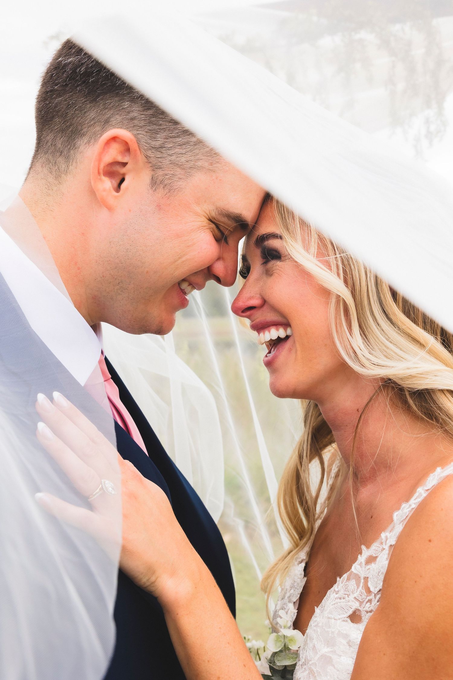 A romantic wedding couple shares intimate close-up moments in a series of tender portraits.