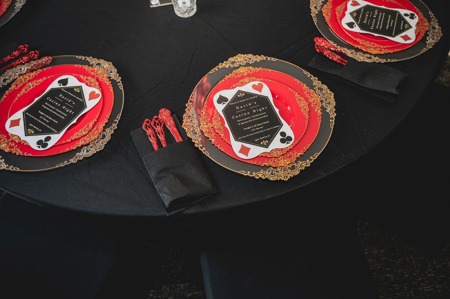 Detailed close-up photo of a row of Chicago Bulls NBA team logos on black merchandise.