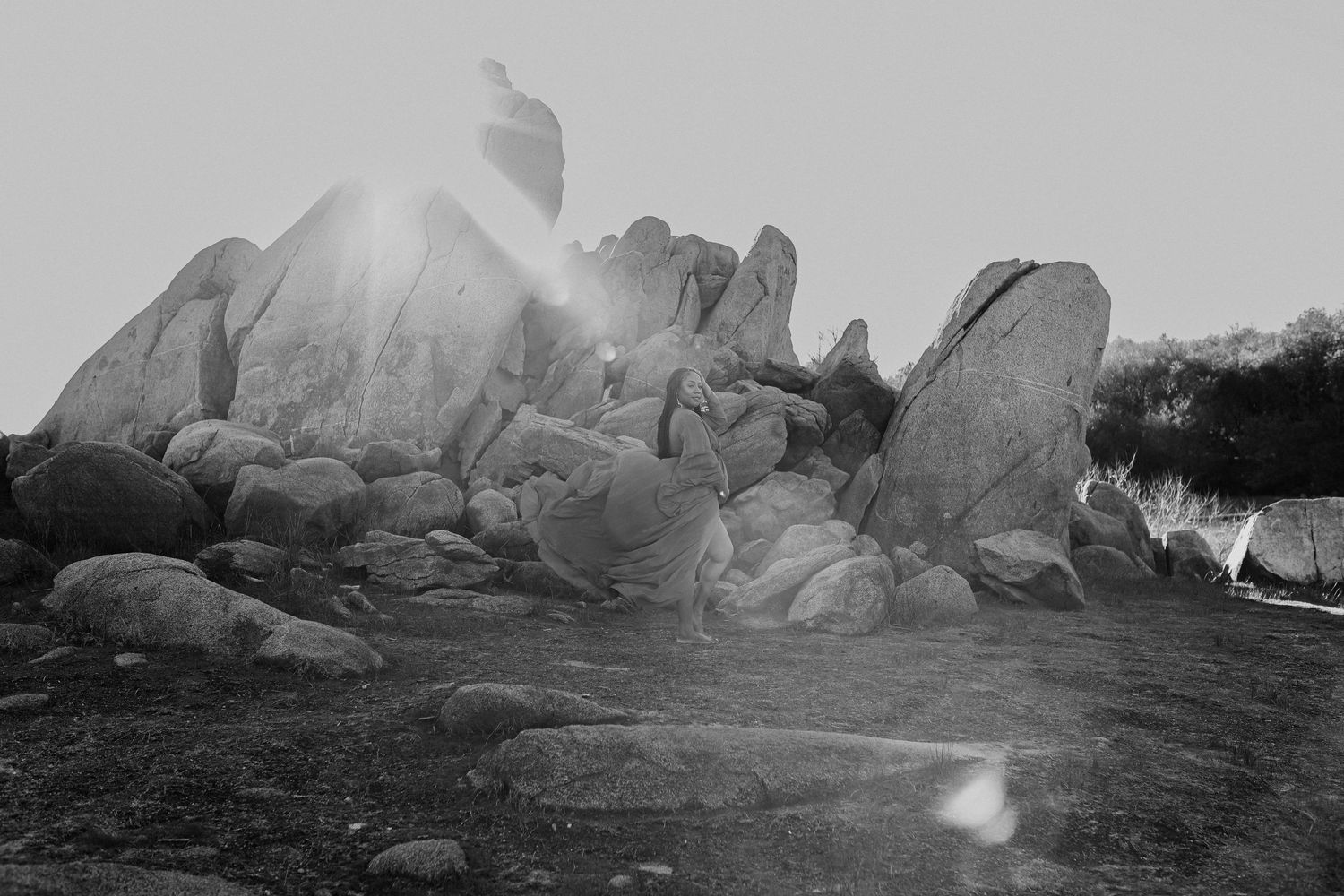 A panoramic series of rocky coastal landscapes with dramatic sunlight and ocean views.