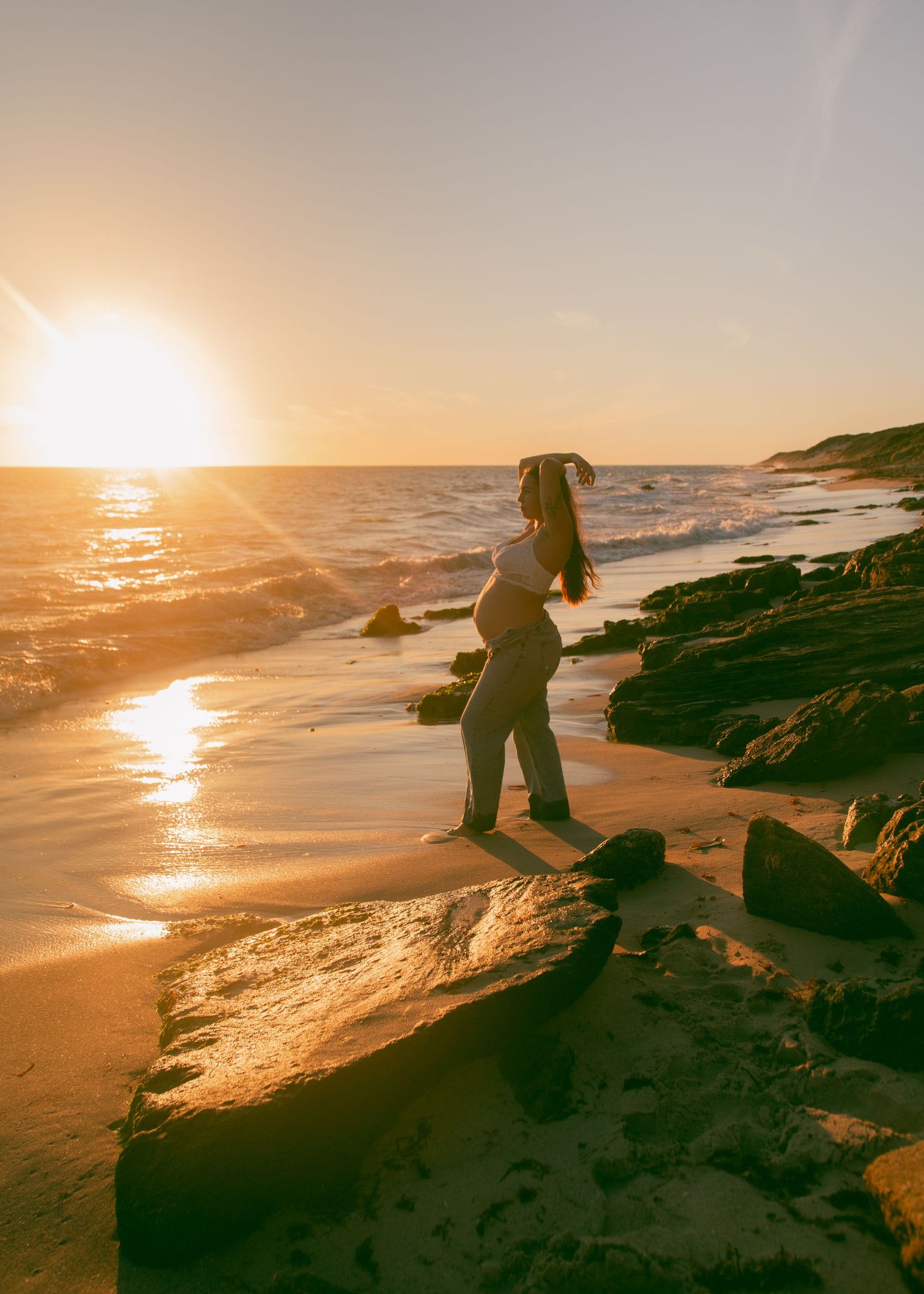 Pregnant women on a beach in Western Australia