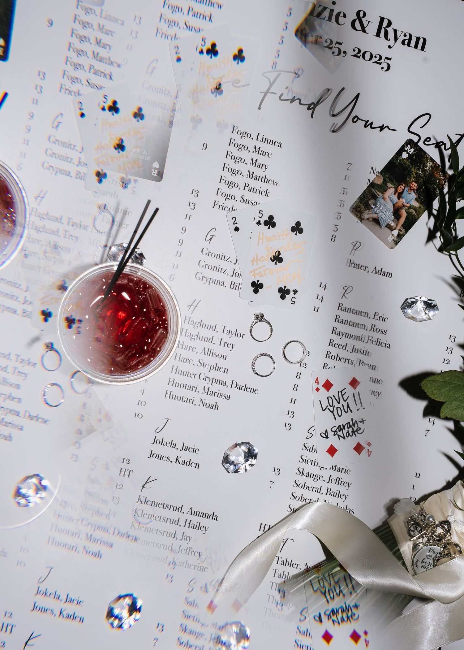 A wedding planner calendar with dates and decorative stickers spread across white pages showing event details.