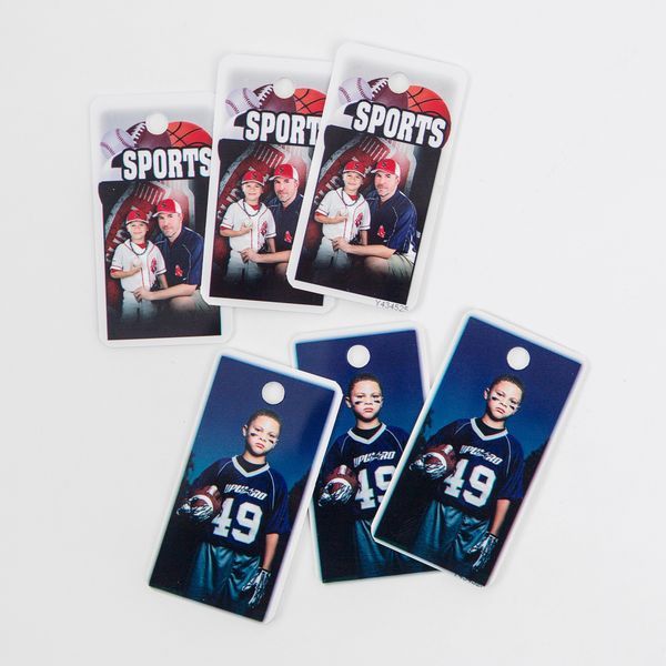 Sports trading cards displayed in a row showing blue and red color schemes on white background.