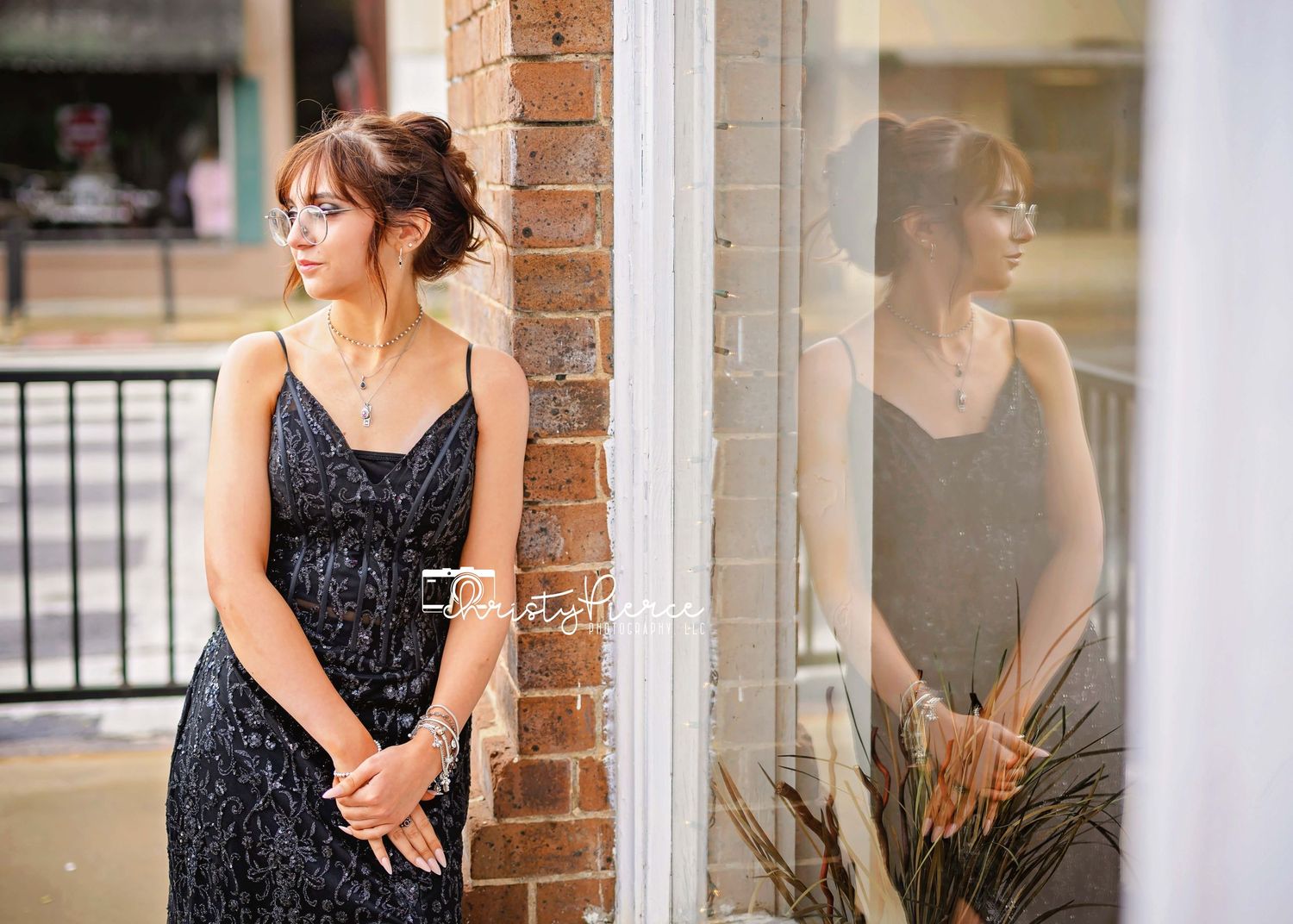 A woman in a black sequined dress poses elegantly against a brick wall in a series of connected photos.