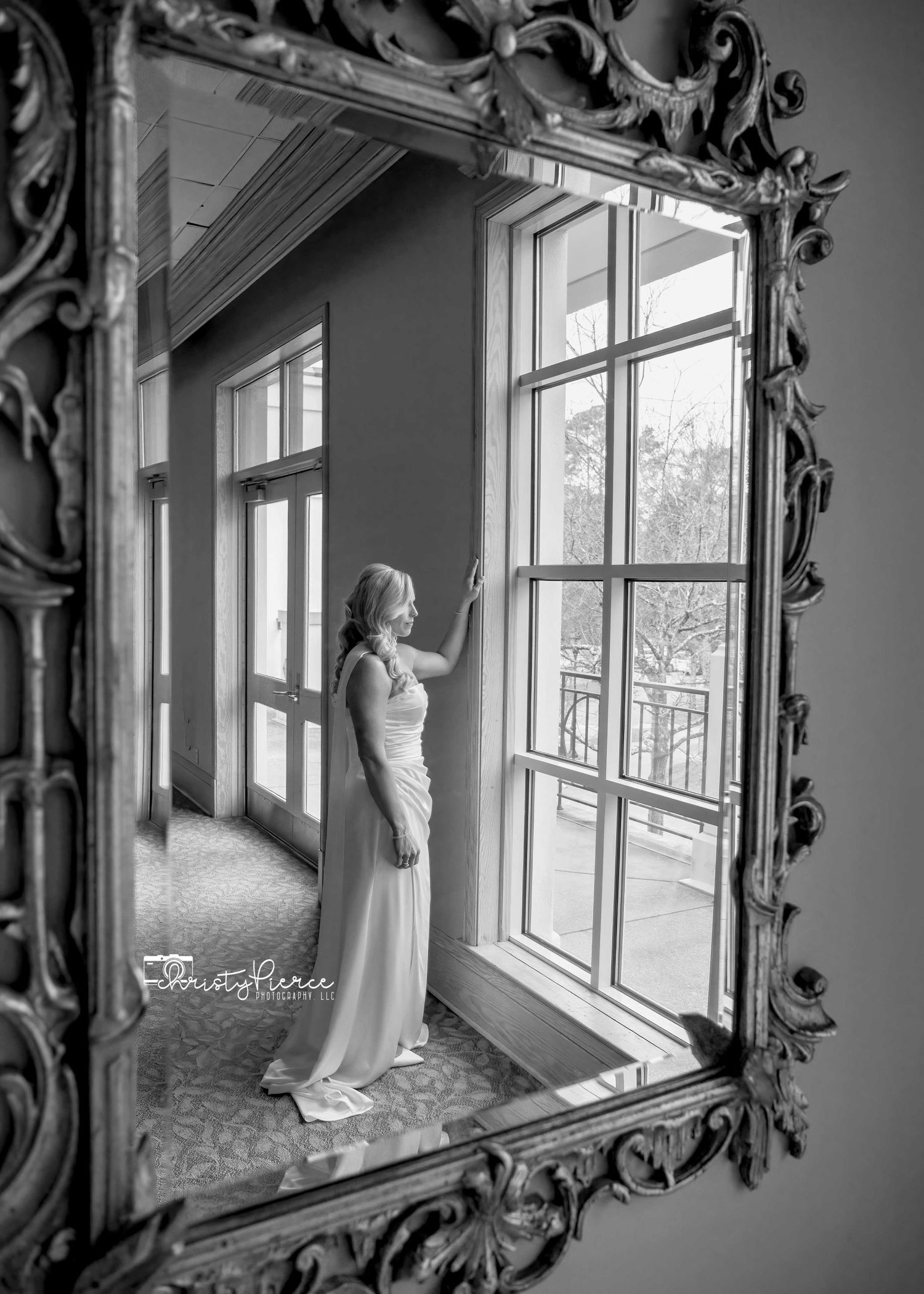 Black and white artistic photographs of a figure standing by ornate windows in an elegant interior space.