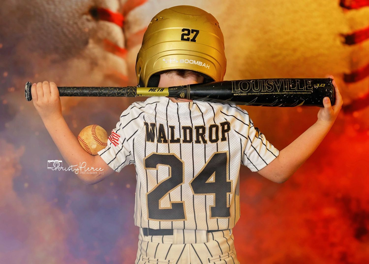 Baseball player wearing pinstriped jersey with number 24 stands against orange and red background.