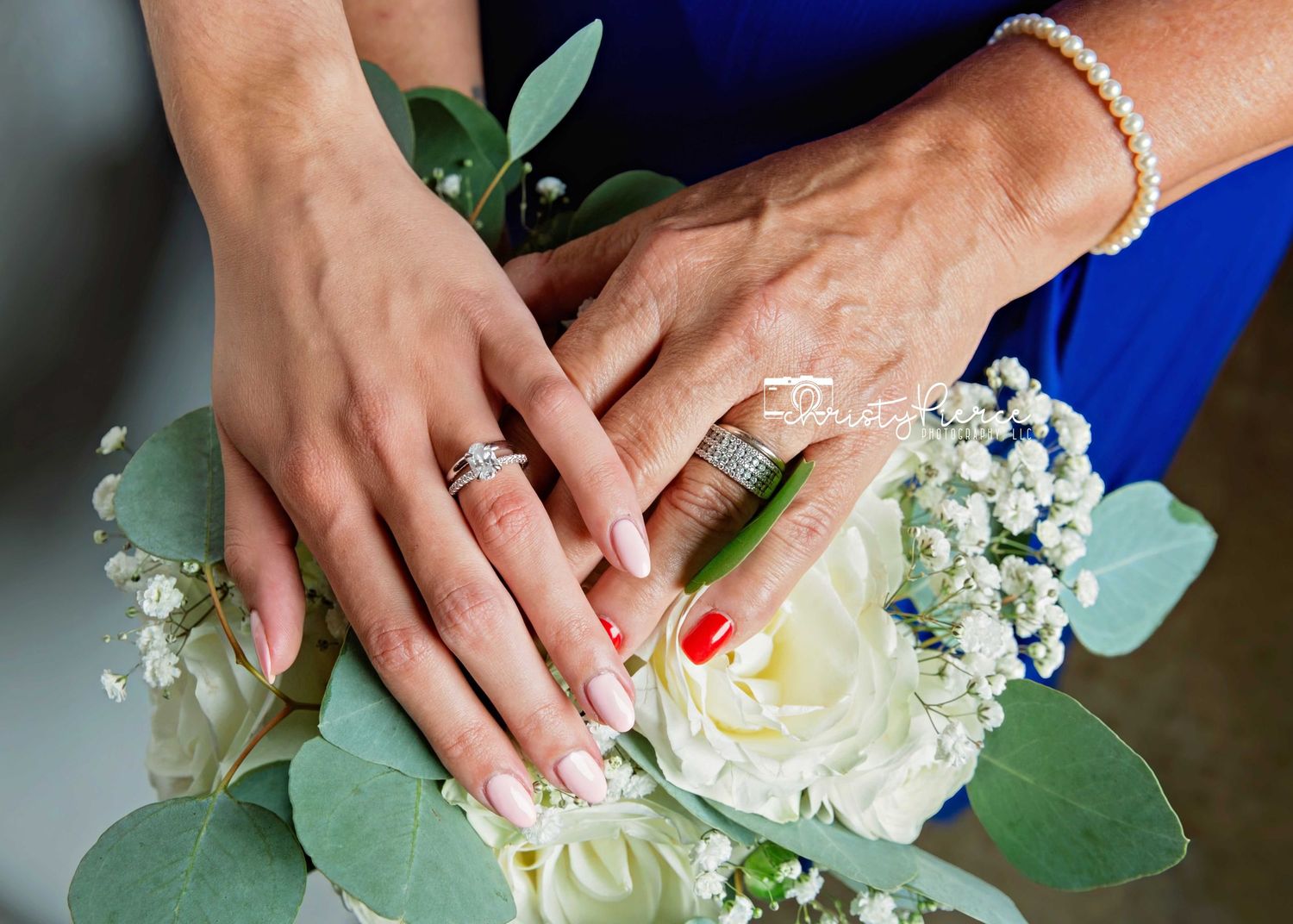 Step by step floral arrangement process showing hands assembling white roses and greenery into a bouquet.