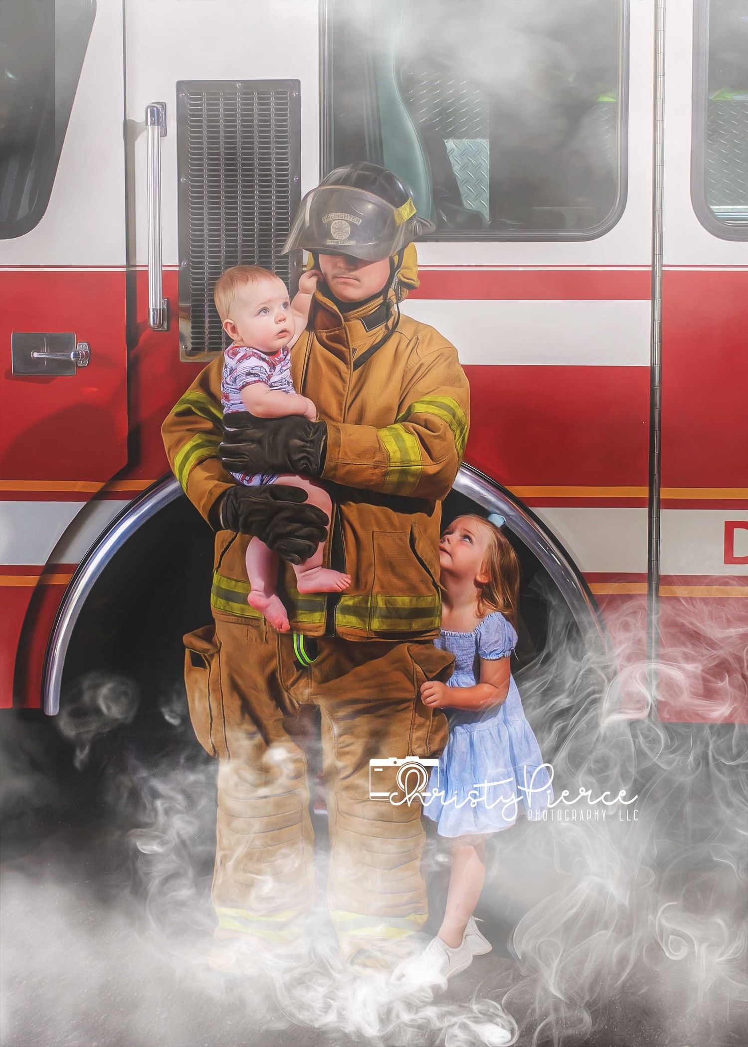 Firefighter in full gear holds baby while young girl stands beside him in front of a red fire truck with dramatic smoke.